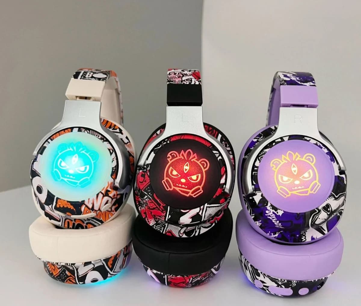 Graffiti-korvanapaiset Bluetooth-kuulokkeet RGB-valoilla ja mikrofonilla